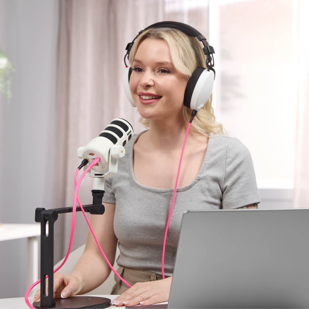 Girl with white NTH-100 using white PodMic USB on DS2